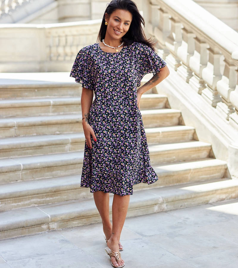 Das schwarze Blumenkleid von Protasio