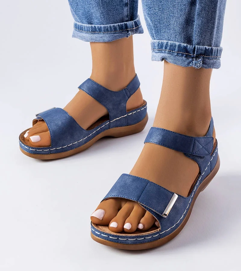 Żółte czółenka na słupku z motywem skóry wężą   Dolores