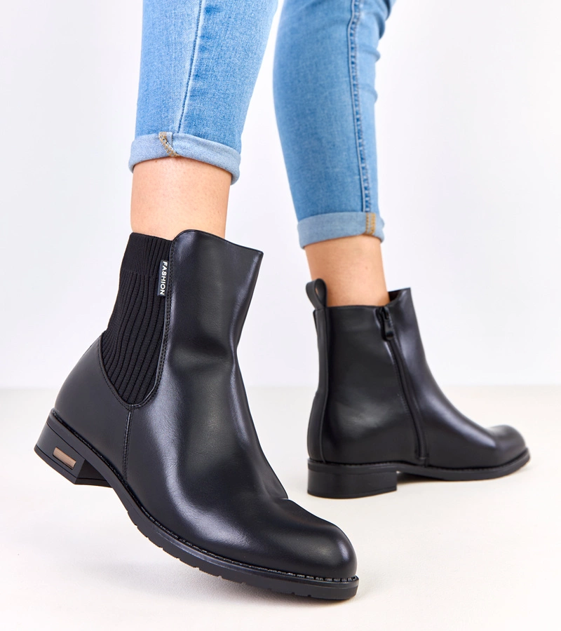 Schwarze Stiefeletten mit flacher Sohle und elastischem Einsatz Gres