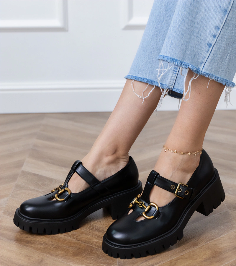 Schwarze Halbschuhe mit dicker Sohle und goldener Verzierung Hartis