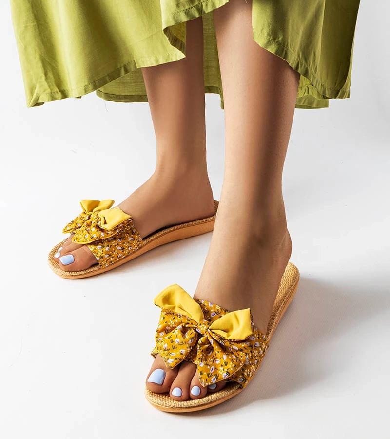 Gelbe Flip-Flops mit Schleife Tachel