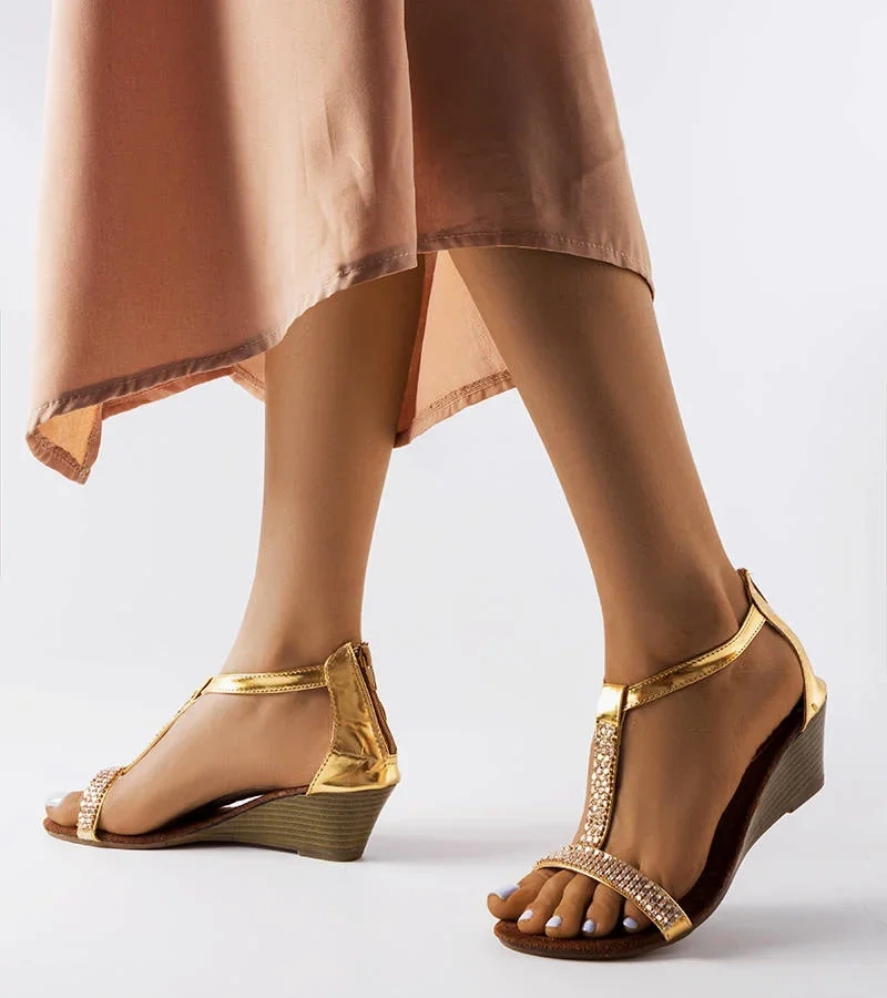 Goldene Suaredda Keilsandalen