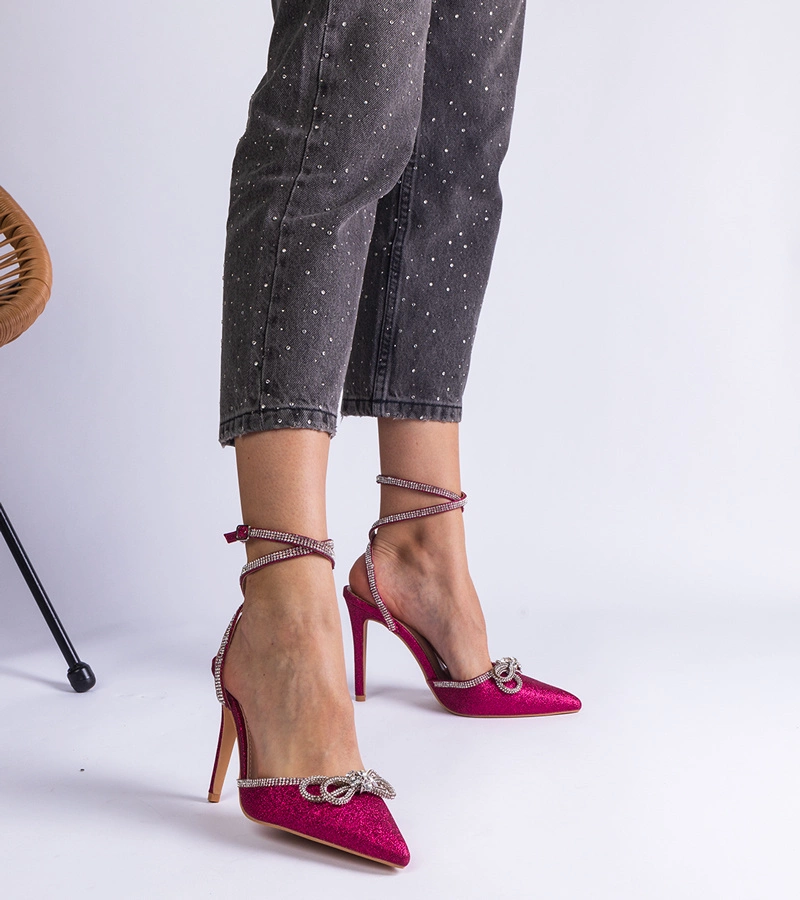 Rosa glitzernde Pumps mit Schleife und Strasssteinen Merkuri