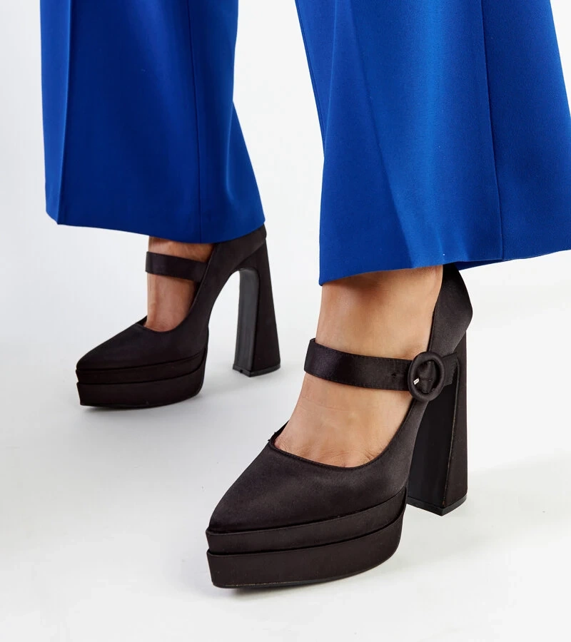 Mike's hohe schwarze Pumps