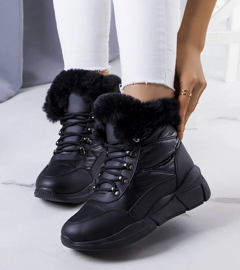 Schwarze gesteppte Axel-Schneestiefel