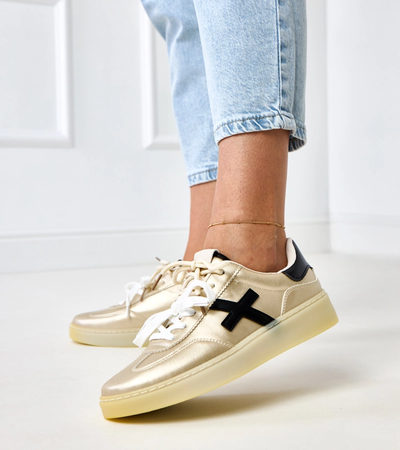 Goldene Sneakers mit Plateausohle und schwarzem Einsatz Eriksen