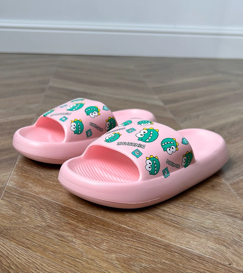 Rosa Kinderpantoletten mit Dino-Print