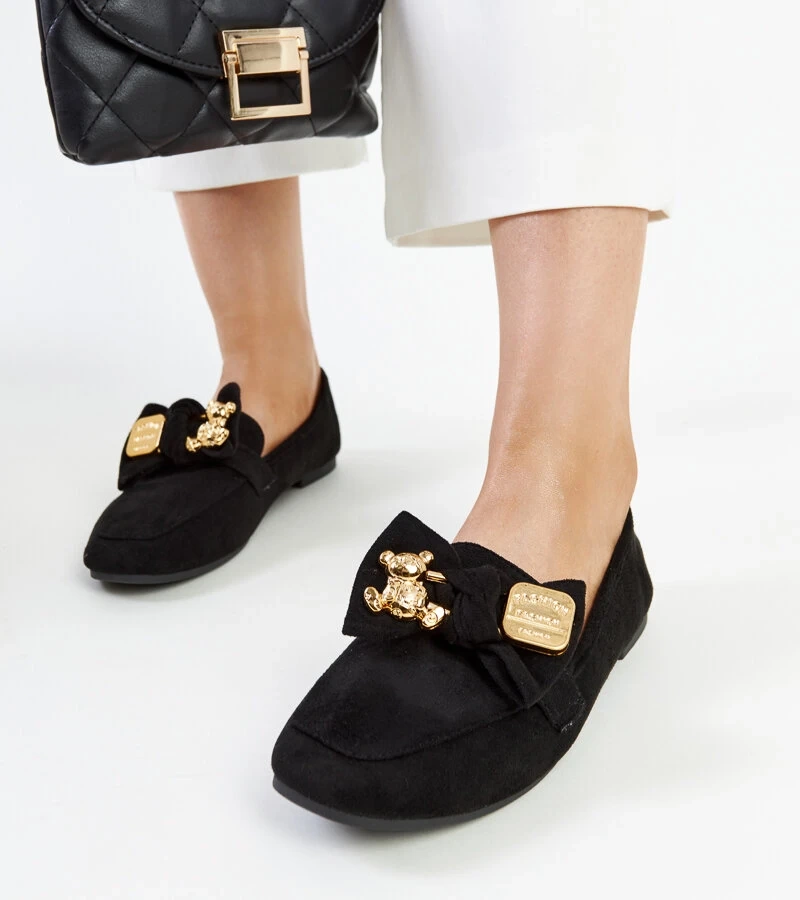 Schwarze Mokassins mit dekorativer Kibra-Schließe