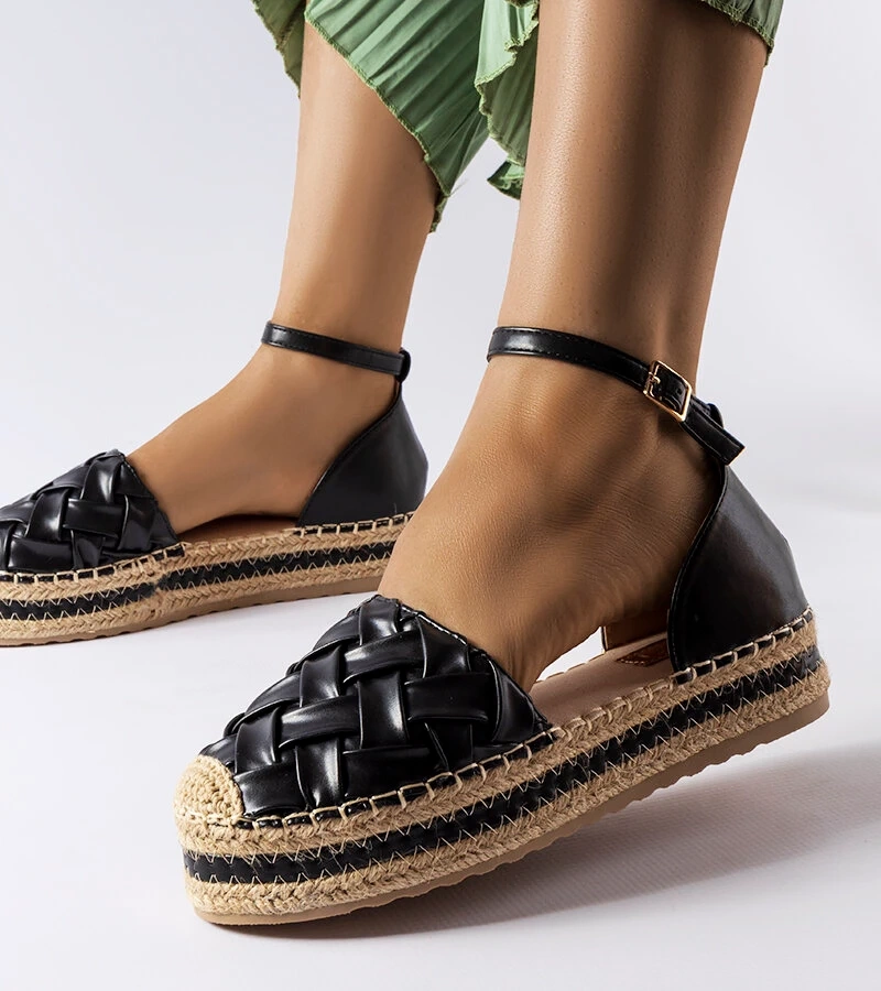 Schwarze Espadrilles mit Gour-Plattform