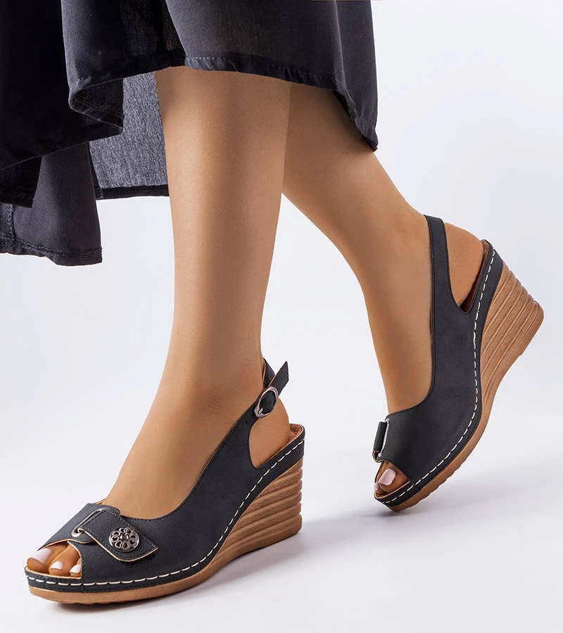 Schwarze Sheridan Keilsandalen