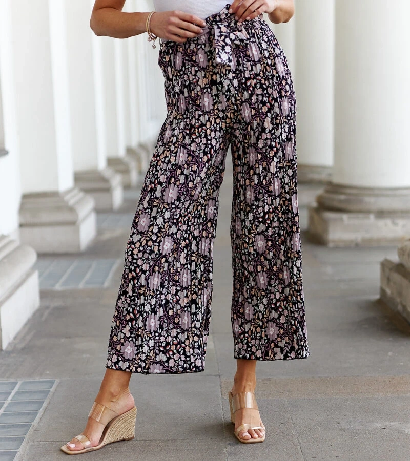 Schwarze plissierte Macognano-Hosen mit Blumenmuster