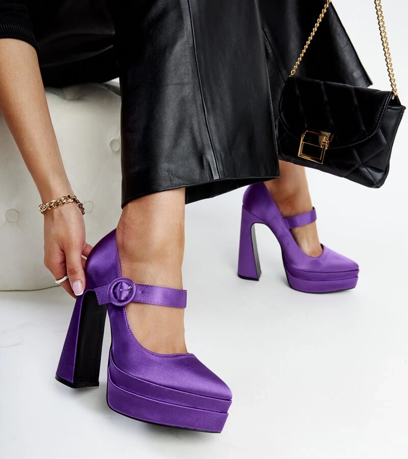 Mike's hohe lila Stöckelschuhe