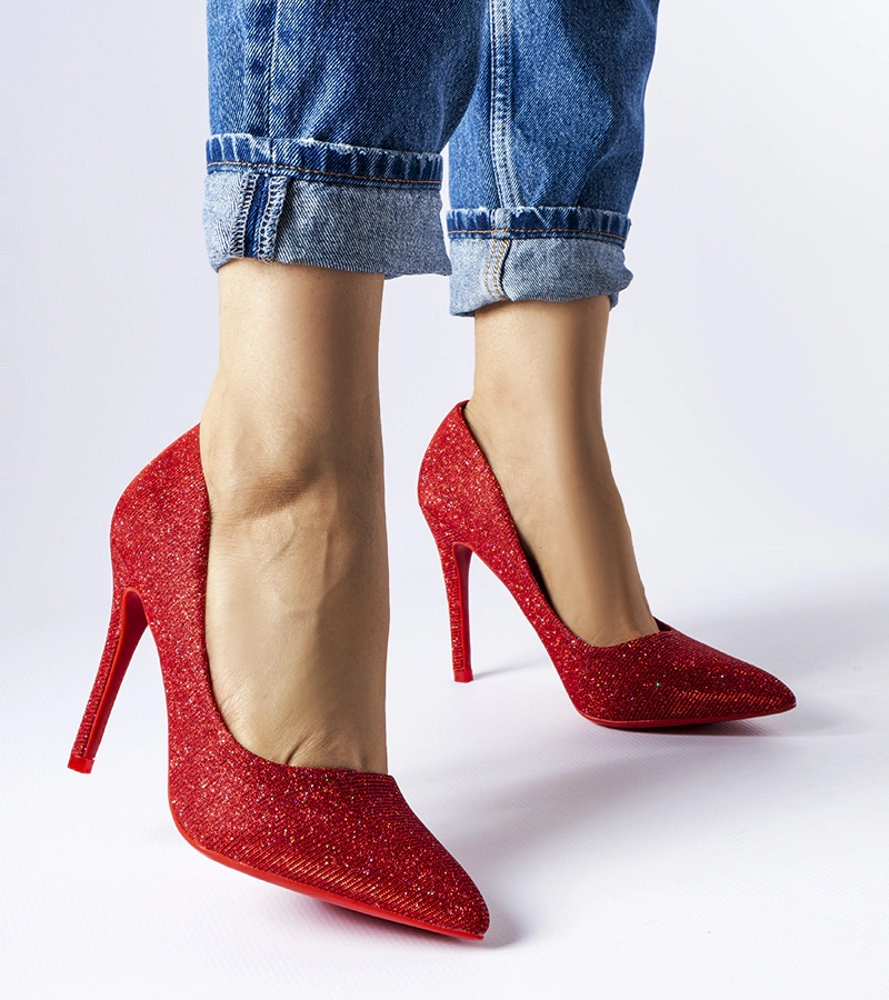 Melodys rote Stilettos