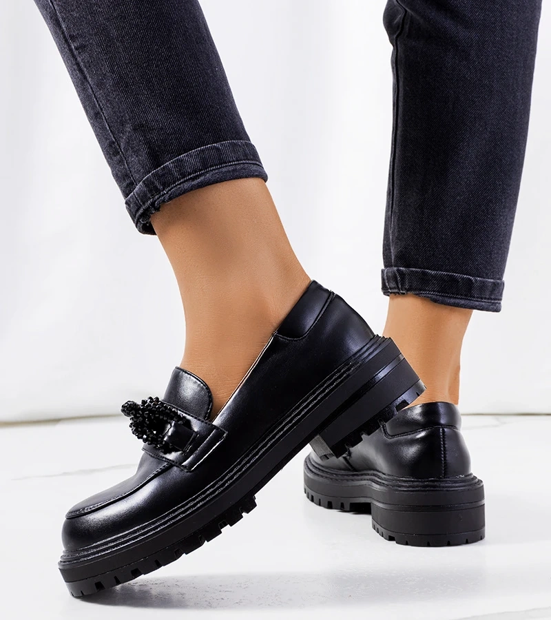 Schwarze Mokassins Curio