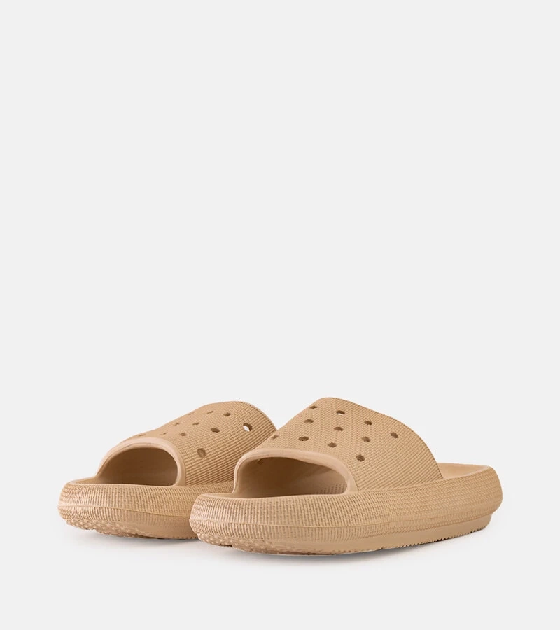 Beige perforierte Adonay-Pantoletten