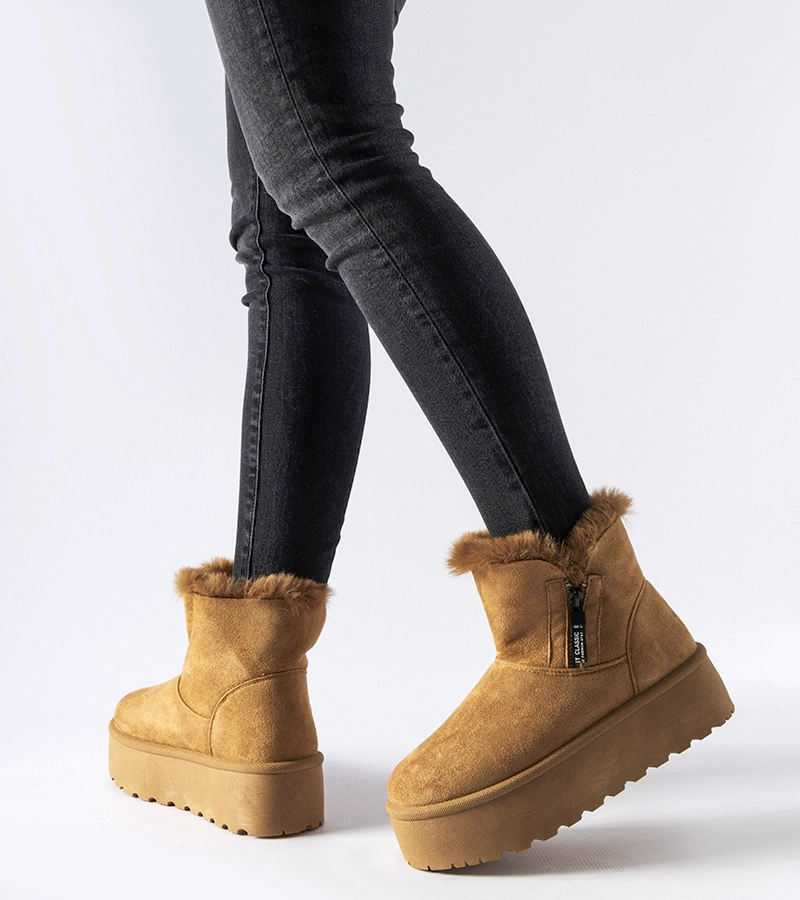 Braune Schneestiefel auf der Points-Plattform