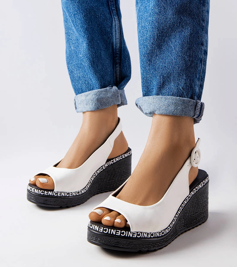 Żółte czółenka na słupku z motywem skóry wężą Dolores