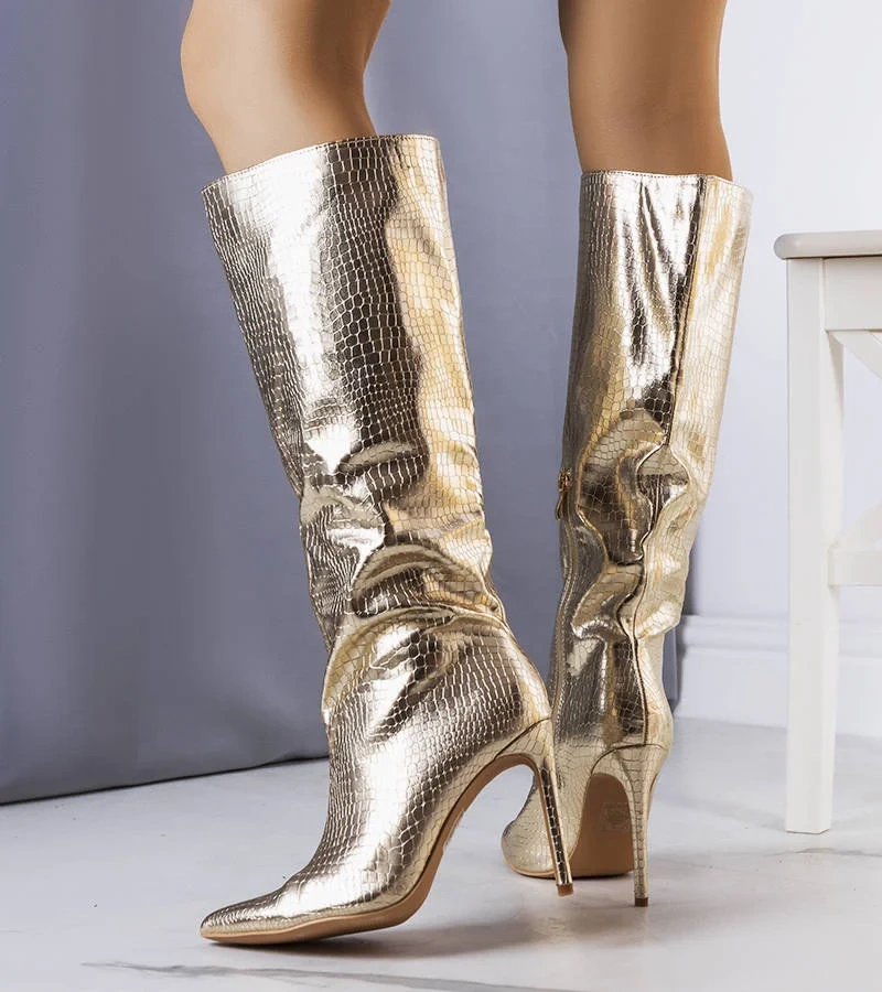Goldene Stiletto-Stiefel von Dinami